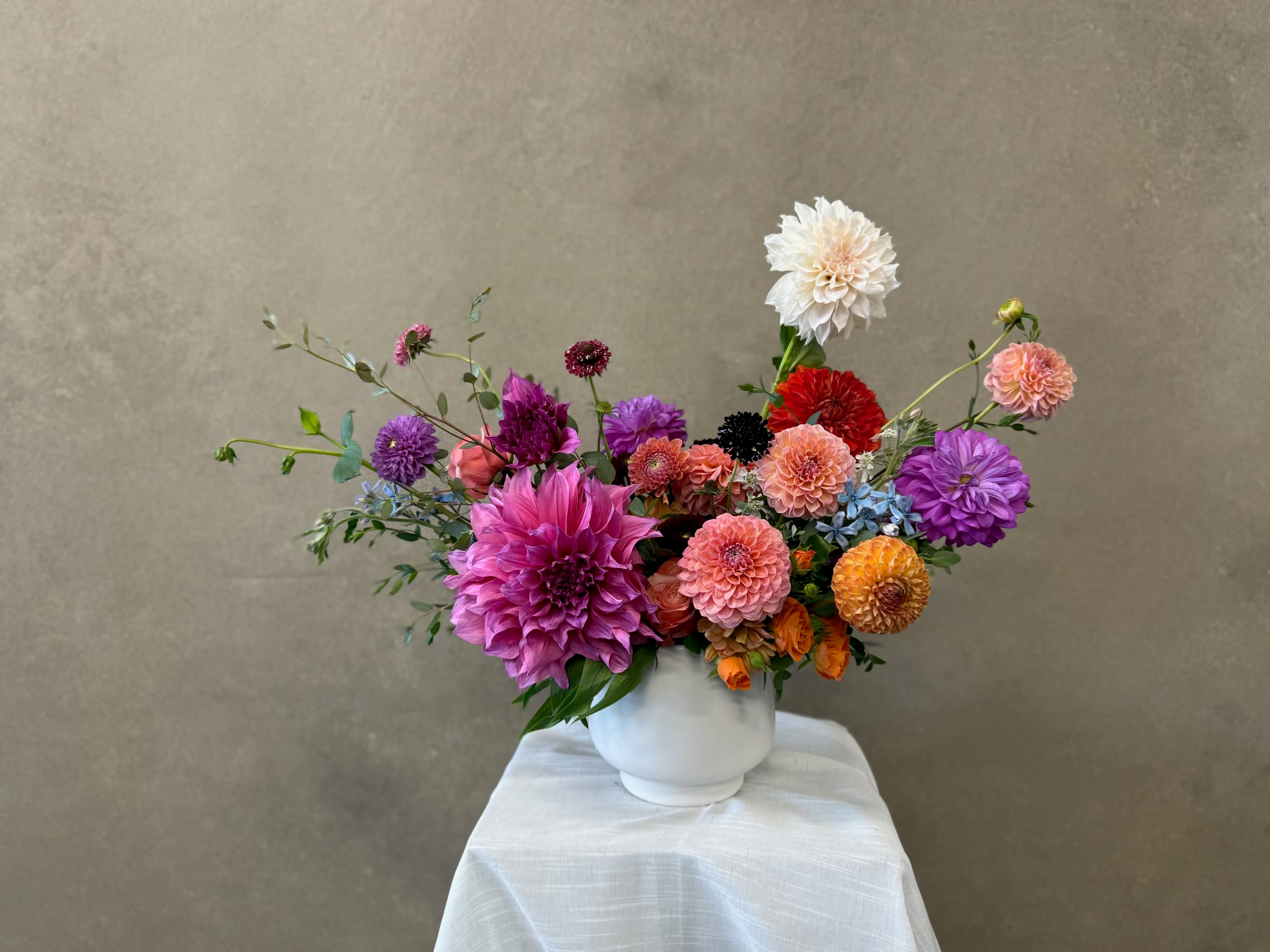 Colorful Delight floral arrangement by Joannie's Florals & Events